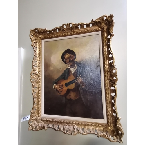 574 - Continental school, Old man playing guitar, oil on canvas, framed. 39cm by 29cm, frame approx. 51cm ... 