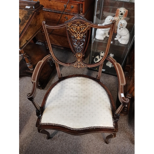 696 - AnAntique armchair with highly decorative marquetry decoration