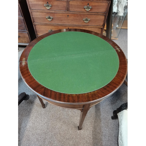 699 - A Victorian mahogany demilune foldover card table, with green baize lining, raised on four square-se... 