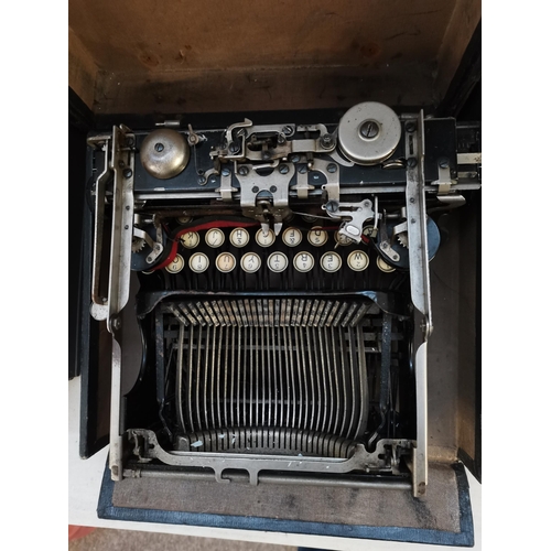 704 - 2 x vintage typewriters and Singer sewing machine