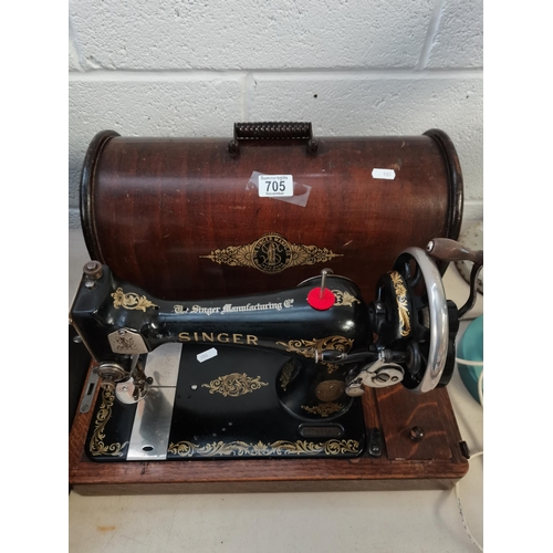 705 - Vintage Singer Sewing machine in wooden case (hand operated)