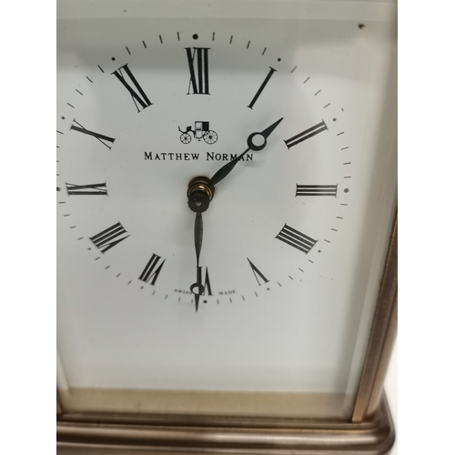 16 - A Matthew Norman Carriage Clock in Brass with box and key - H13.5cm