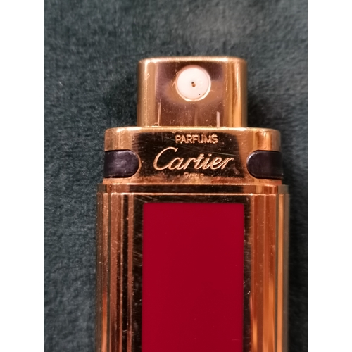 345 - A Cartier Paris gold plated must de perfume vapourisateur in case 7.5ml