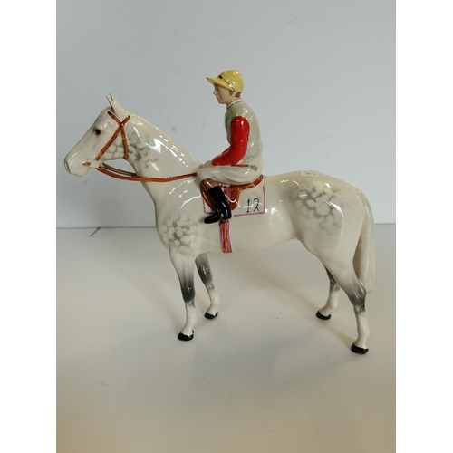 113 - A BESWICK MODEL OF A GREY Racehorse and Jockey on Racehorse No 12 on saddle cloth No 1862 gloss fini... 