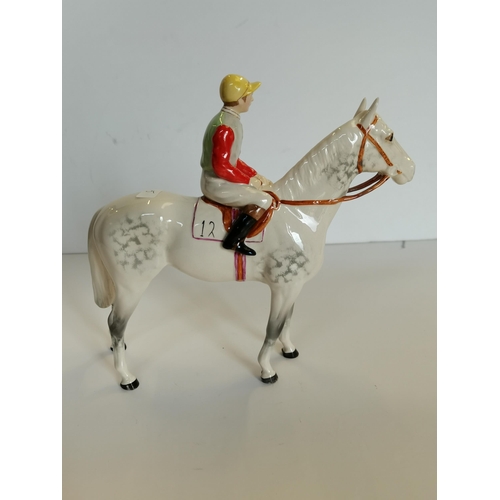 113 - A BESWICK MODEL OF A GREY Racehorse and Jockey on Racehorse No 12 on saddle cloth No 1862 gloss fini... 