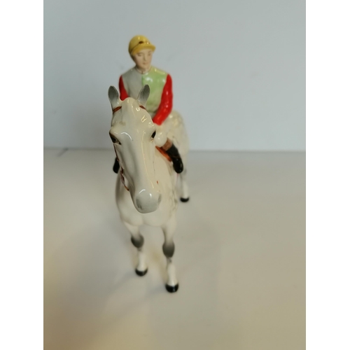 113 - A BESWICK MODEL OF A GREY Racehorse and Jockey on Racehorse No 12 on saddle cloth No 1862 gloss fini... 