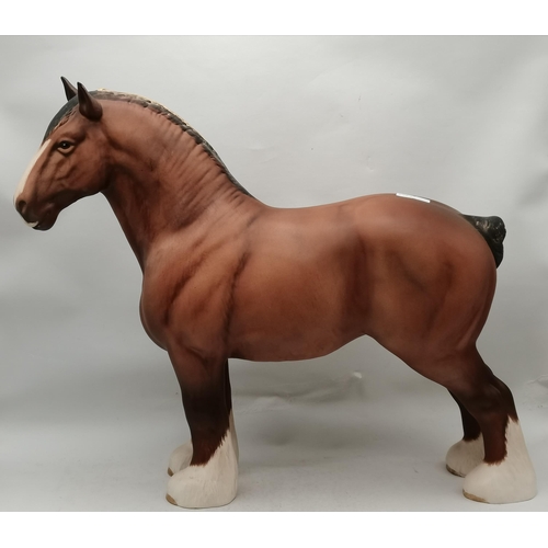 117 - A Beswick shire horse, 'Ch. Burnham Beauty', model no. 2309, matt brown. 26.9cm high