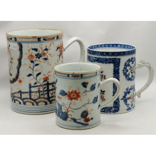 123 - Three Chinese export tankards, late 18th/19th Century, two Imari decorated, the third with Famille R... 