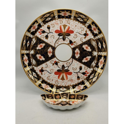 169 - A Crown Derby pin dish and similar 23cm plate both marked on base