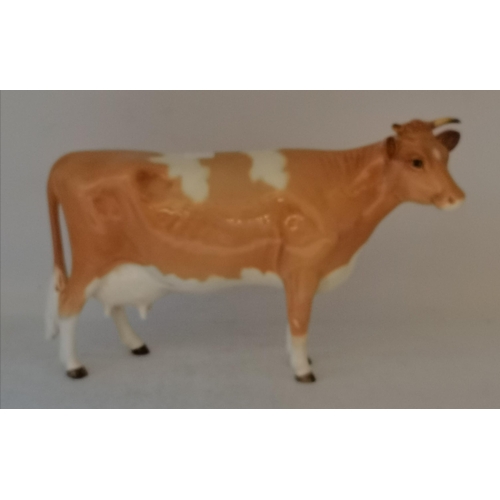 28B - A Beswick Hereford Bull 'Ch. of Champions', model no. 1363A, matt; together with a Beswick Guernsey ... 