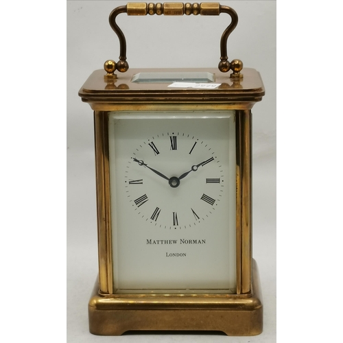 4 - An English brass carriage clock by Matthew Norman, London, c.1960s, the rectangular cream dial with ... 