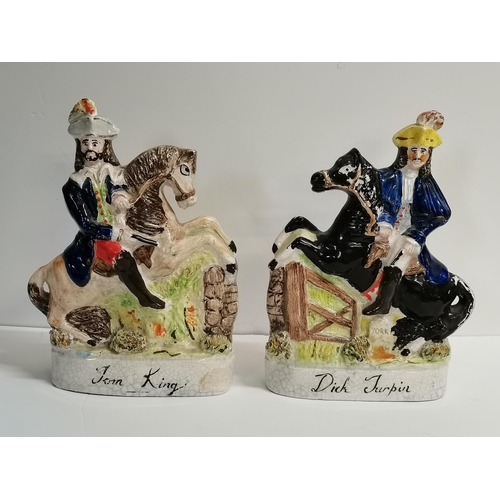 44 - A Pair of Staffordshire dogs and 2 large Staffordshire flatback figures of men on horseback
