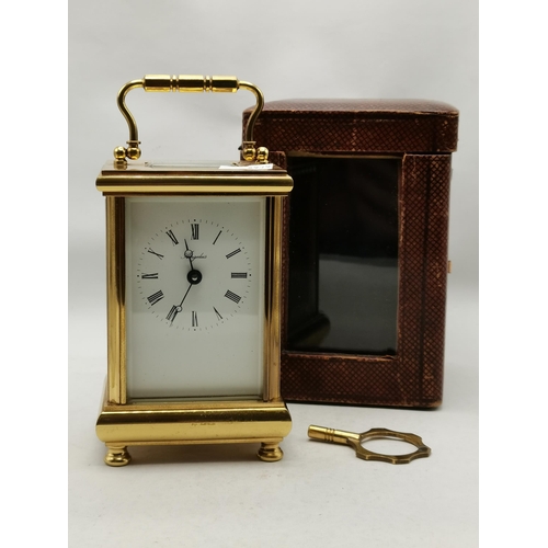 6 - An English brass carriage clock by Angelus, 20th Century, 11 Jewels, the rectangular cream dial with... 