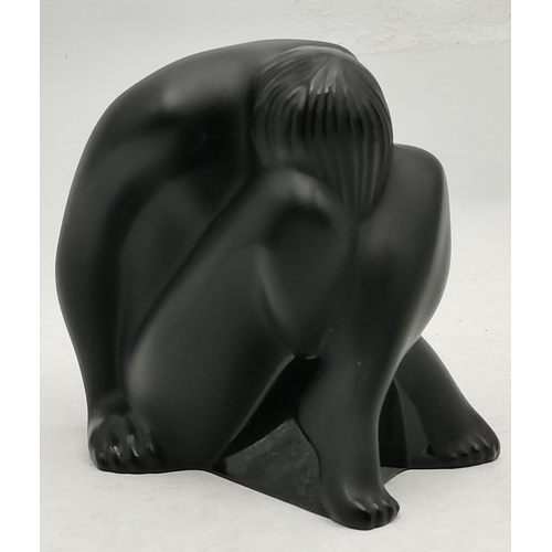 8 - Lalique: a 'Nu Assis (Noir)' paperweight, c.1993, press-moulded and frosted black glass, as a female... 