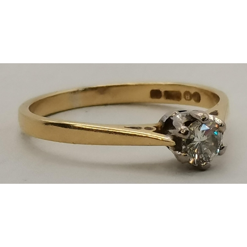 450I - An 18 carat gold solitaire diamond ring, hallmarked, stamped '750' and '.25' carat. Ring size M, 2.2... 