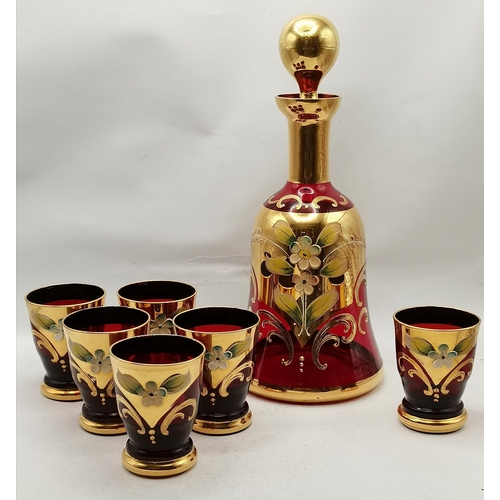 255 - A Bohemian ruby and gilt glass bell decanter and six glasses, enamel painted with flowers; together ... 