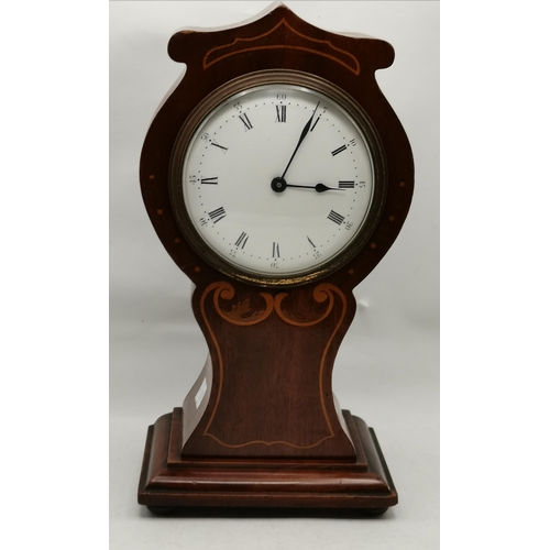 256 - An Edwardian mahogany inlaid mantel clock, the cream enamel dial with Roman numerals; together with ... 