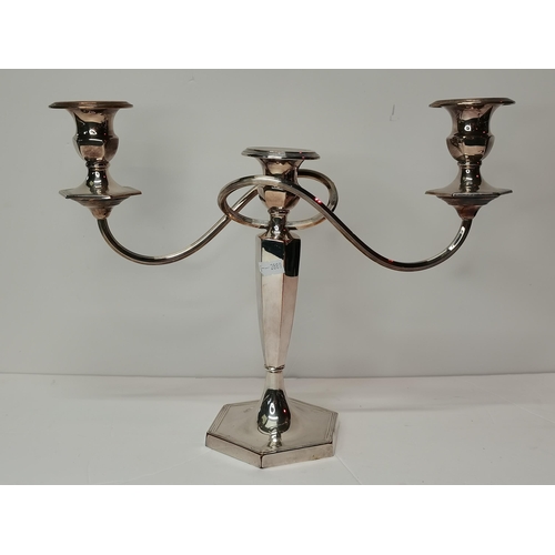 299 - A George V silver candlestick by John & William F Deakin, Chester 1918, the tapering octagonal stem ... 