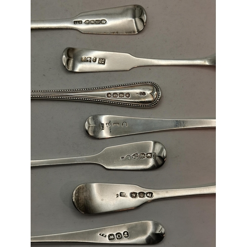 302 - A large quantity of assorted silver teaspoons, Georgian and later, various patterns, dates and maker... 