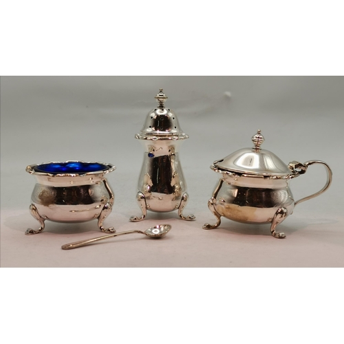 304 - A group of assorted silver-plate and pewter, comprising a silver-plated cruet set by Adie Brothers L... 