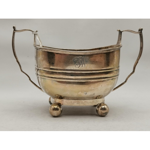 337 - An Edwardian teapot and twin-handled sugar bowl by Turner Bradbury, London 1903, rounded rectangular... 