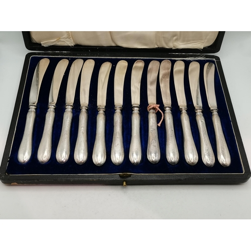 338 - A group of mixed silver including a pair of George V serving spoons by Cooper Brothers & Sons Ltd, S... 