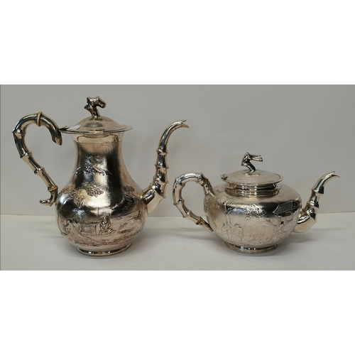 380 - A Chinese export silver five-piece tea service, late 19th/early 20th Century, comprising coffee pot,... 