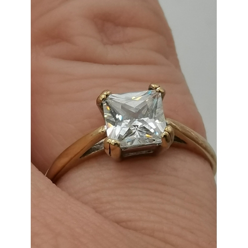 399 - Three 9 carat gold rings, various settings and stones. (3) Square-cut solitaire ring size O, solitai... 