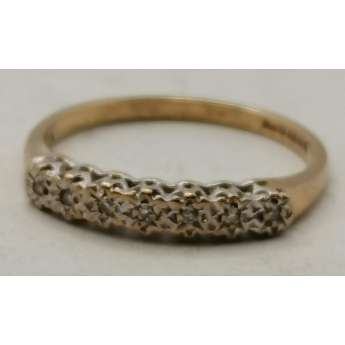 405 - Yellow Gold Stamped '375' Eternity ring with a band of white stones