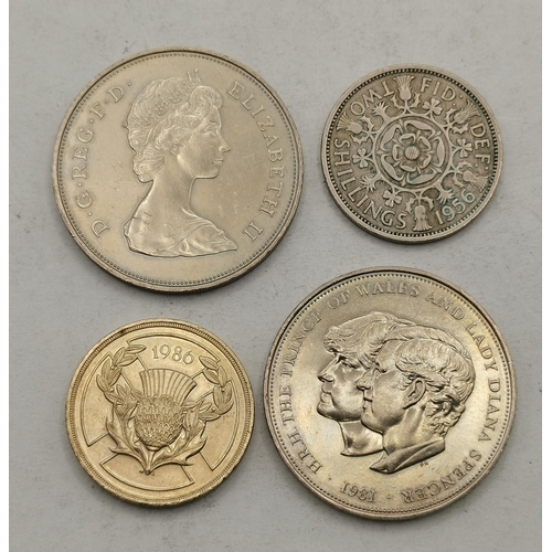 421 - Four coins, Elizabeth II, comprising two Charles and Diana 1981 commemorative crowns, a 1980 two pou... 