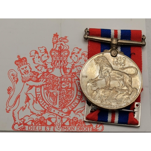 423 - A miscellaneous group of items including a WWII War Medal 1939-1945; a white-metal 'Ypres les Halles... 