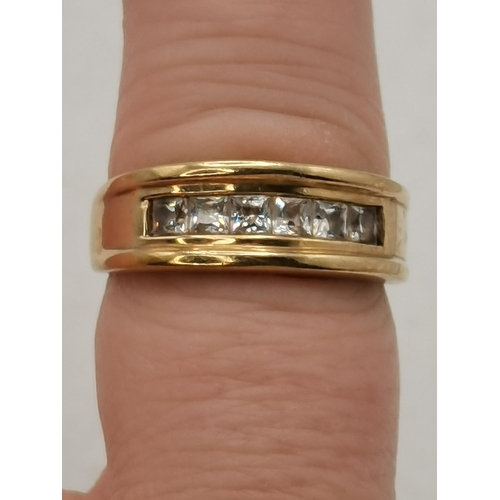 431 - A 9 carat gold wedding band, hallmarked, ring size L; and a 9 carat gold and white-stone ring, hallm... 