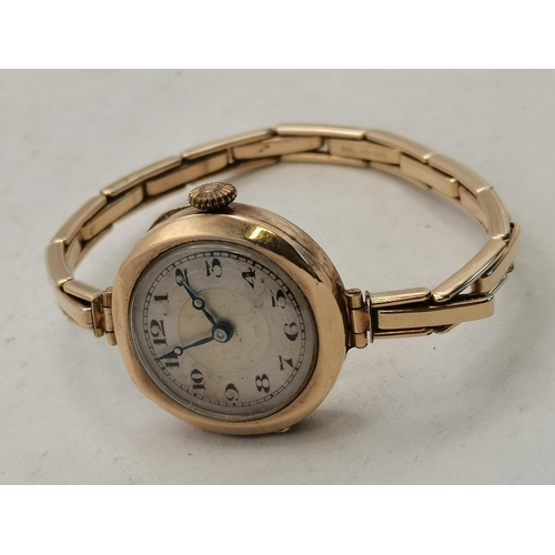 448 - A lady's 9 carat gold bracelet wristwatch, the circular dial with Arabic numerals, the case marked '... 