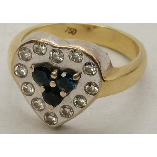 450F - An Art Deco 18 carat white and yellow gold heart-shaped diamond and sapphire ring, stamped '750'. Ri... 