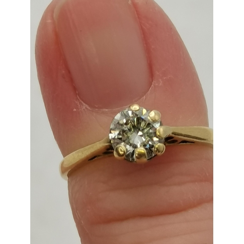 450G - An 18 carat gold solitaire diamond ring, hallmarked, stamped '750'. Ring size F, 0.2 carat, 1.6g