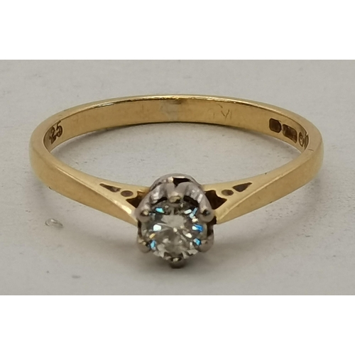 450I - An 18 carat gold solitaire diamond ring, hallmarked, stamped '750' and '.25' carat. Ring size M, 2.2... 