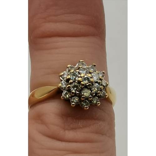 452 - 18ct Yellow Gold Diamond cluster ring Size L  - Diamonds are set in a claw setting stamped 750 and h... 