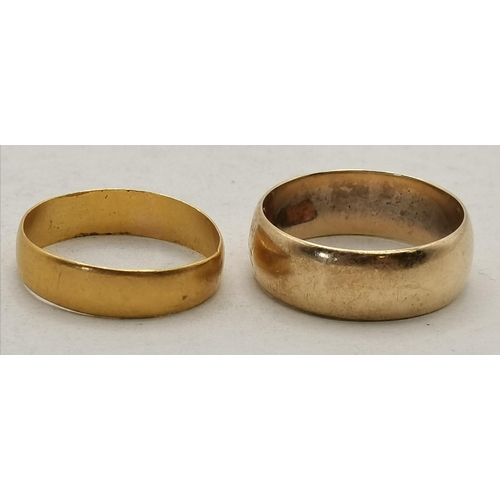 458 - A 22 carat gold wedding band and a 9 carat gold wedding band. (2) 22 carat ring size N, marked '22';... 