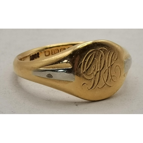 459 - An 18 carat gold signet ring, the circular top engraved with initials, to rat-tail shoulders. Ring s... 