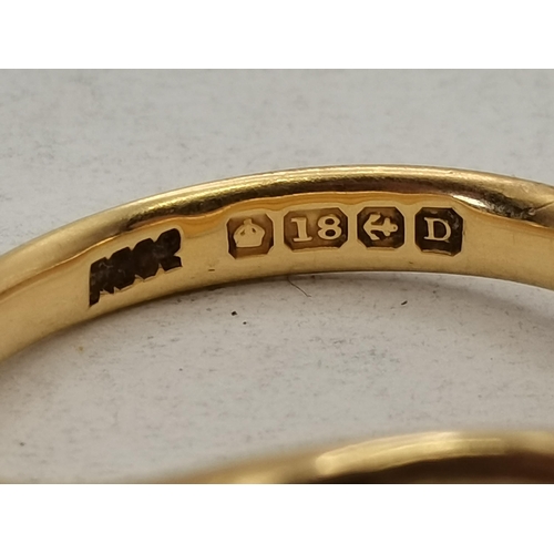 459 - An 18 carat gold signet ring, the circular top engraved with initials, to rat-tail shoulders. Ring s... 