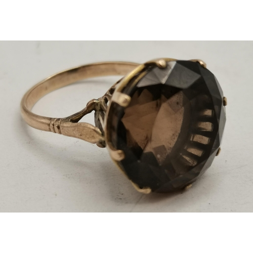 461 - Two dress rings, comprising a 14 carat gold large single stone ring in a claw setting, marked '14', ... 