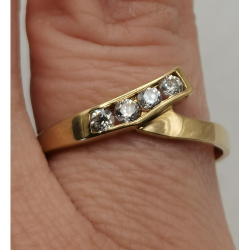 464 - 9ct Yellow Gold Wishbone ring size R with 4 small cut diamonds gross weight 2grams marked '375'