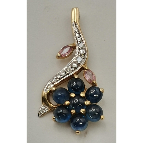 467 - A 9 carat gold pink and blue sapphire and diamond pendant, the blue sapphires set as a flowerhead wi... 