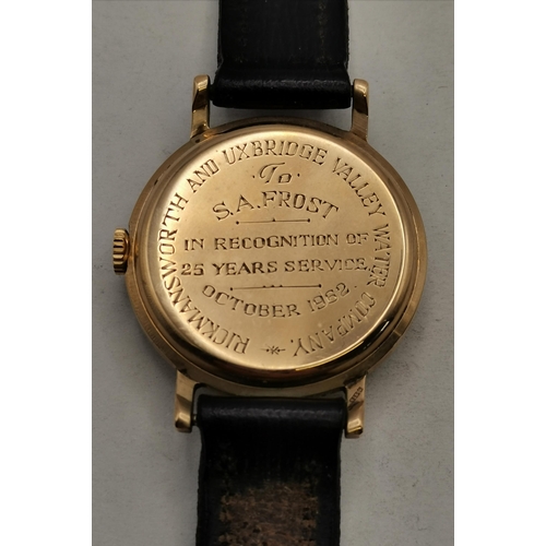 473A - Two 9 carat gold wristwatches, comprising a gent's strap wristwatch, the cream 29mm dial signed 'Smi... 