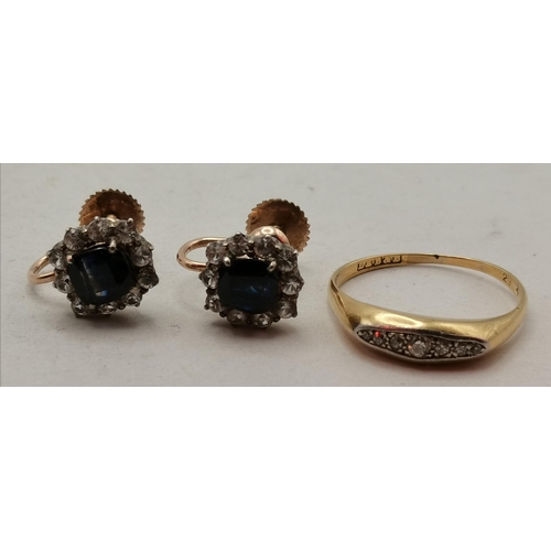 475D - A yellow metal and white-stone ring, maker's mark only (likely gold), navette-set with seven graduat... 