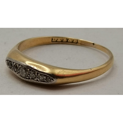 475D - A yellow metal and white-stone ring, maker's mark only (likely gold), navette-set with seven graduat... 