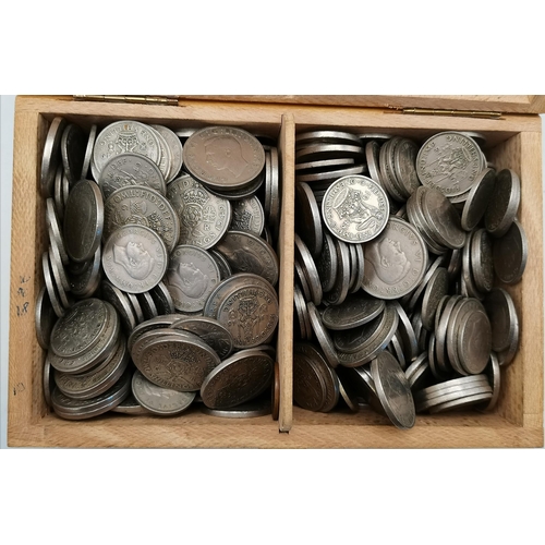 486 - Two boxes of assorted post-1947 silver coinage, comprising sixpences, one shillings and two shilling... 