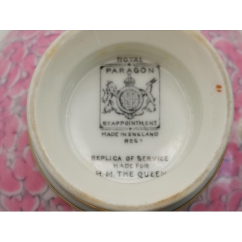 260 - An Art Deco Royal Paragon part tea service, 'Replica of Service made for H.M. The Queen', pink hydra... 