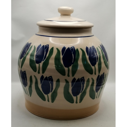 280 - A large baluster storage jar and cover by Nicholas Mosse Pottery, Ireland, decorated with blue tulip... 