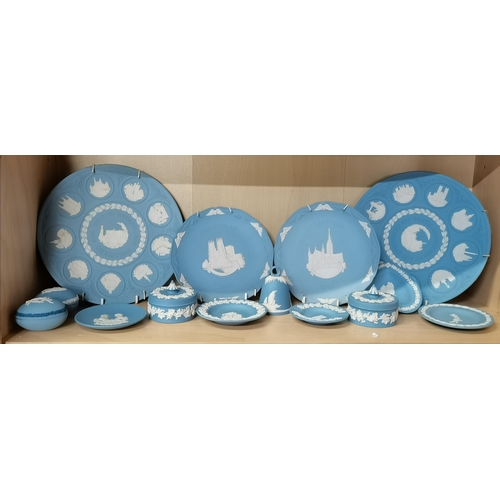 291 - A group of Wedgwood blue jasperware, including commemorative plates, trinket dishes, covered boxes, ... 